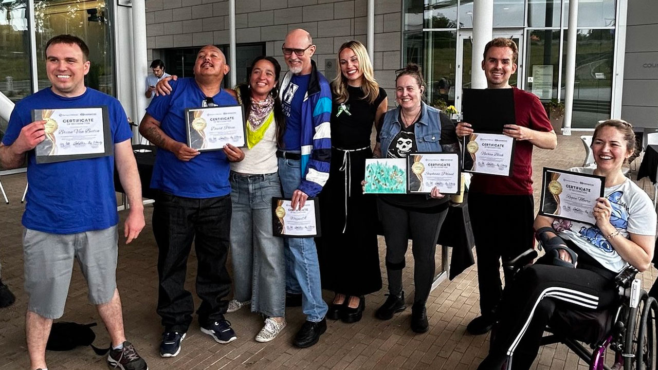 Ryan’s Reach program participants posing together at a gathering